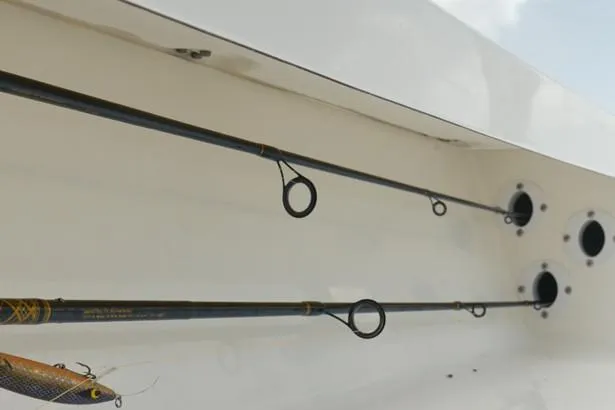 Slide: The Image of 2026 Spyder FX19 Vapor boat interior with steering console and seating. - 12