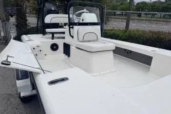 Slide: The Image of 2026 Spyder FX19 Vapor boat with sleek white deck and modern console design. - 14