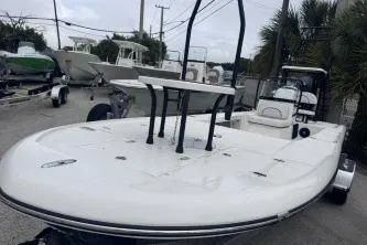 Slide: The Image of 2026 Spyder FX19 Vapor boat in a marina, showcasing sleek design and modern features. - 15