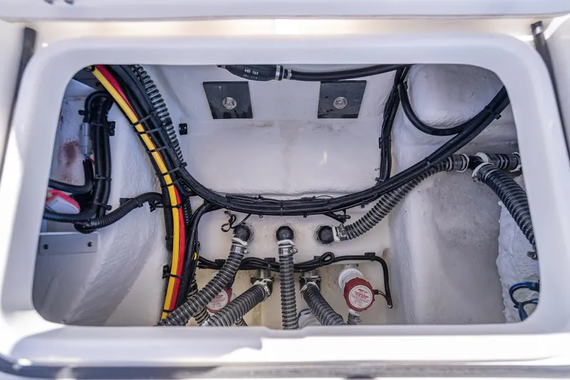 Slide: The Image of 2026 Spyder FX19 Vapor boat wiring and plumbing compartment. - 29