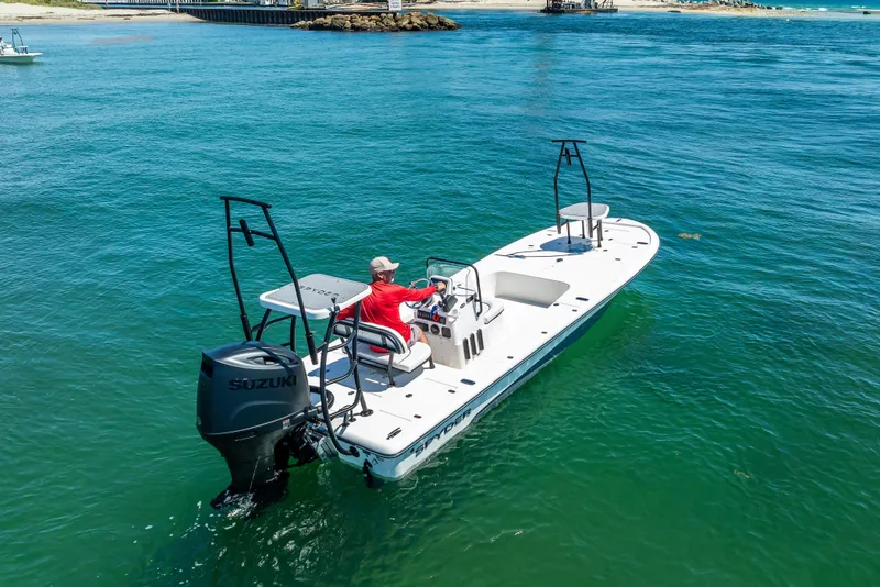 Slide: The Image of 2026 Spyder FX19 Vapor boat with sleek white deck and modern console design. - 49