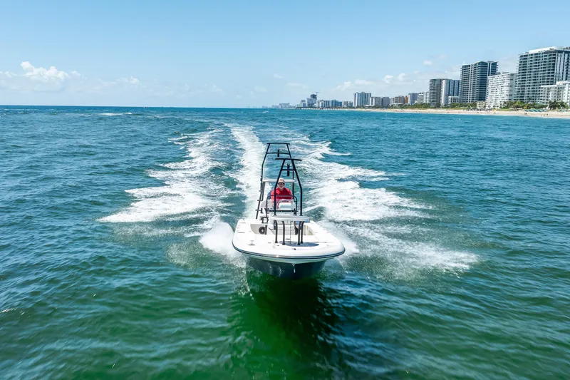 Slide: The Image of 2026 Spyder FX19 Vapor boat on trailer, showcasing sleek design and branding. - 56