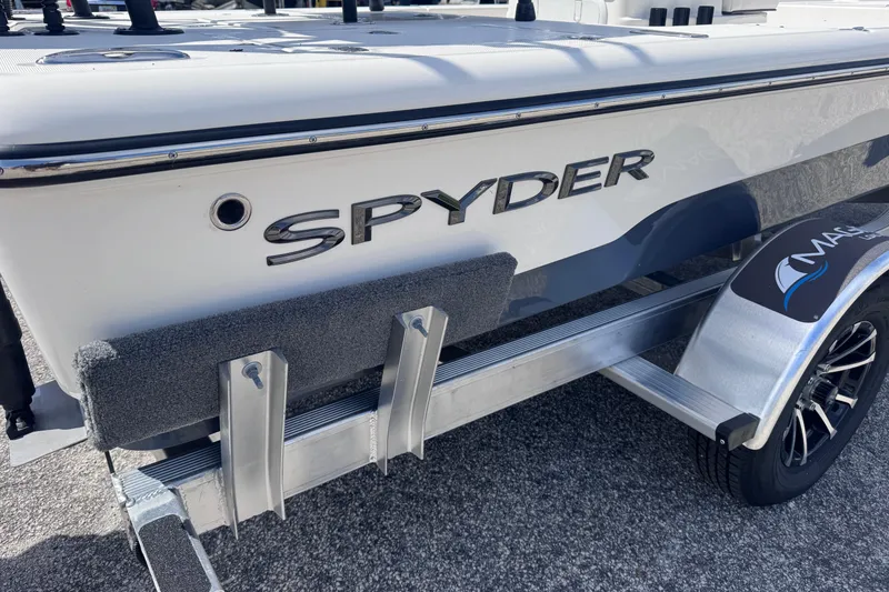 Slide: The Image of 2026 Spyder FX19 Vapor boat on trailer, showcasing sleek design and branding. - 6