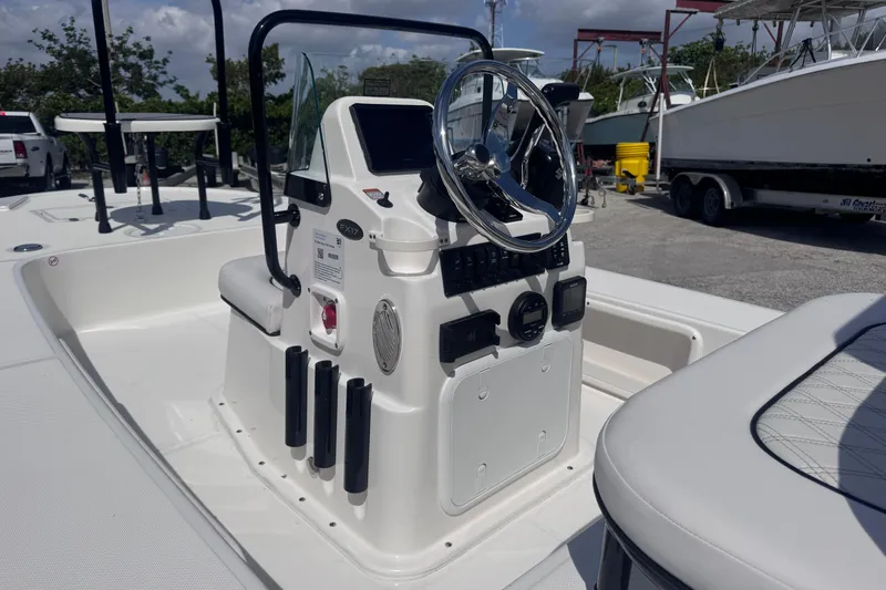 Slide: The Image of 2026 Spyder FX17 Flicker boat console with steering wheel and controls. - 10