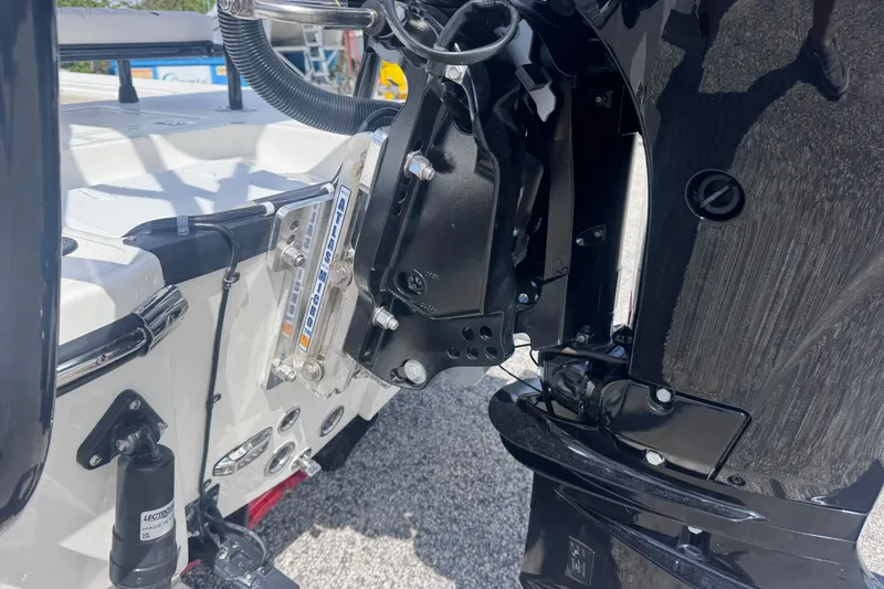 Slide: The Image of Close-up of 2026 Spyder FX17 Flicker boat engine and mounting components. - 14