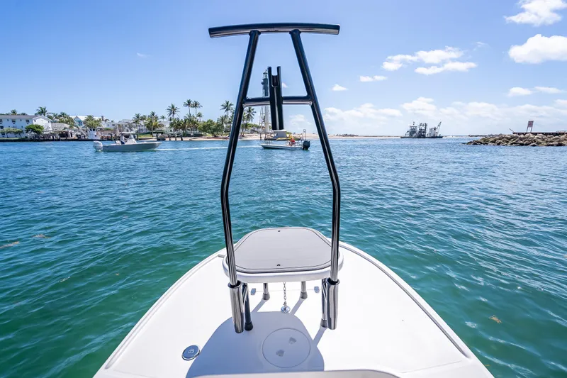 Slide: The Image of Bow view of 2026 Spyder FX17 Flicker boat on clear blue water. - 25