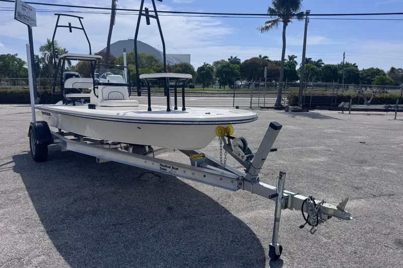 Slide: The Image of 2026 Spyder FX17 Flicker boat on trailer in sunny outdoor setting. - 3