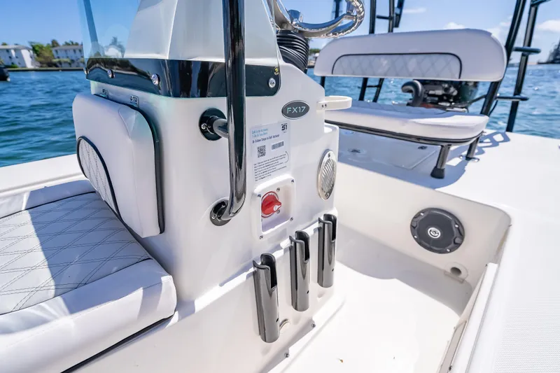 Slide: The Image of 2026 Spyder FX17 Flicker boat interior with sleek seating and modern controls on the water. - 30