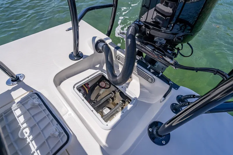 Slide: The Image of 2026 Spyder FX17 Flicker boat engine compartment with visible wiring and components. - 40