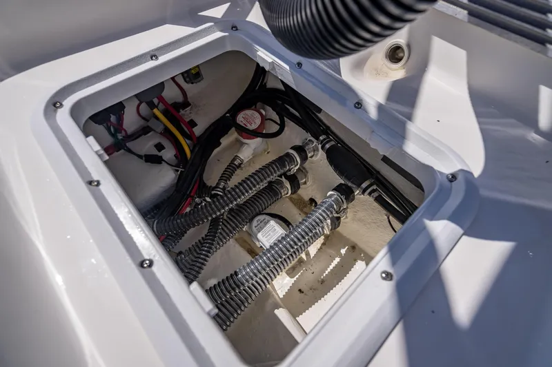 Slide: The Image of 2026 Spyder FX17 Flicker boat wiring and plumbing compartment. - 41