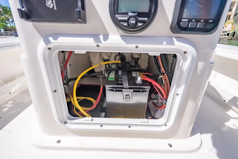 Slide: The Image of Battery compartment of 2026 Spyder FX17 Flicker boat with wiring and controls. - 42