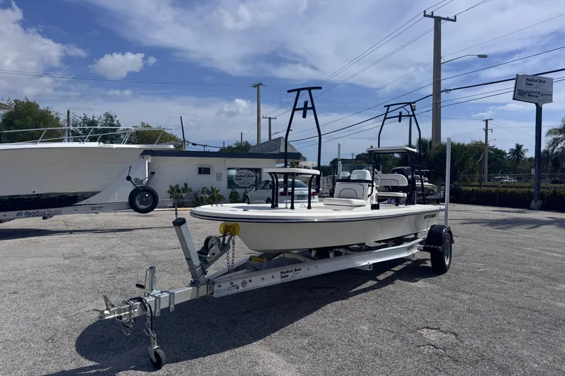 Slide: The Image of 2026 Spyder FX17 Flicker boat on trailer under clear sky. - 5