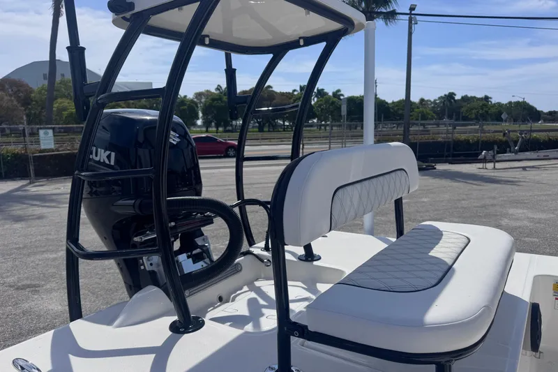 Slide: The Image of 2026 Spyder FX17 Flicker boat with Suzuki engine, featuring a sleek seating area. - 8