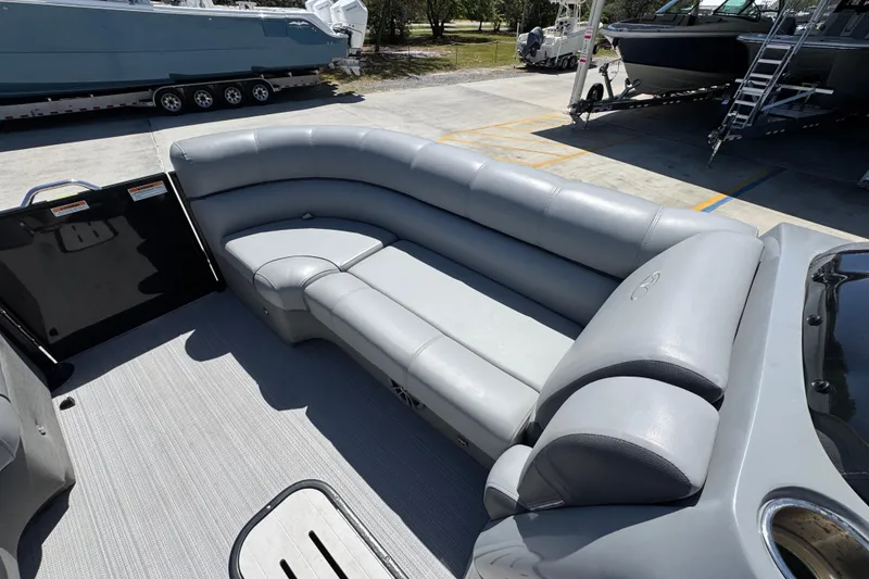 Slide: The Image of 2023 Veranda VTX 25RC pontoon boat with luxurious gray seating and spacious deck. - 20