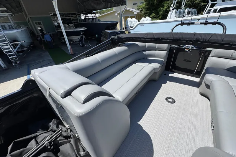 Slide: The Image of Luxurious interior of 2023 Veranda VTX 25RC pontoon boat with spacious seating. - 31