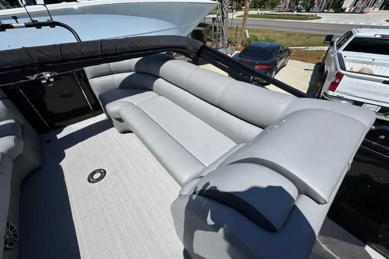 Slide: The Image of 2023 Veranda VTX 25RC boat interior with luxurious gray seating and spacious layout. - 32