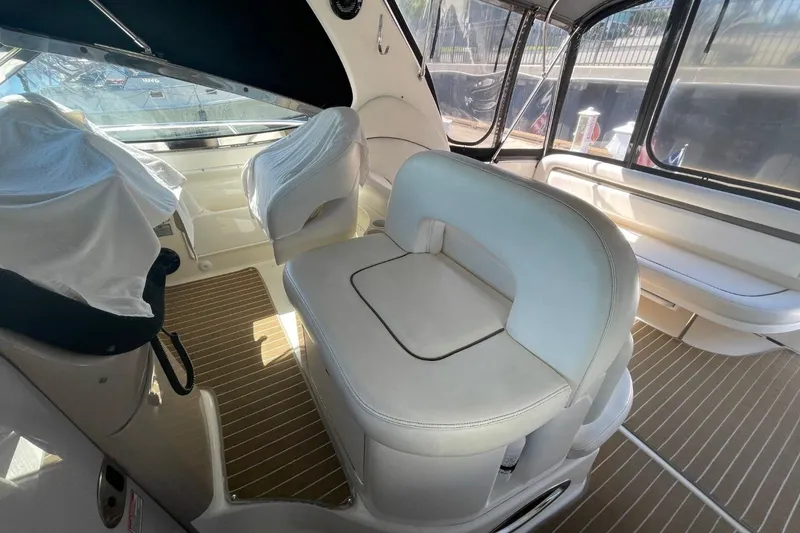 Slide: The Image of Control panel of a 2006 Sea Ray 360 Sundancer boat with switches and display. - 18