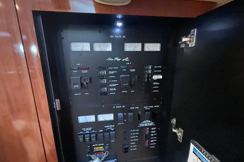 Slide: The Image of Open fridge on 2006 Sea Ray 360 Sundancer, stocked with drinks and condiments. - 46