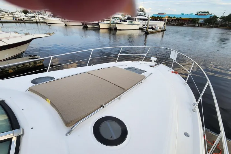 Slide: The Image of Electrical control panel of 2006 Sea Ray 360 Sundancer boat, featuring various switches and gauges. - 49
