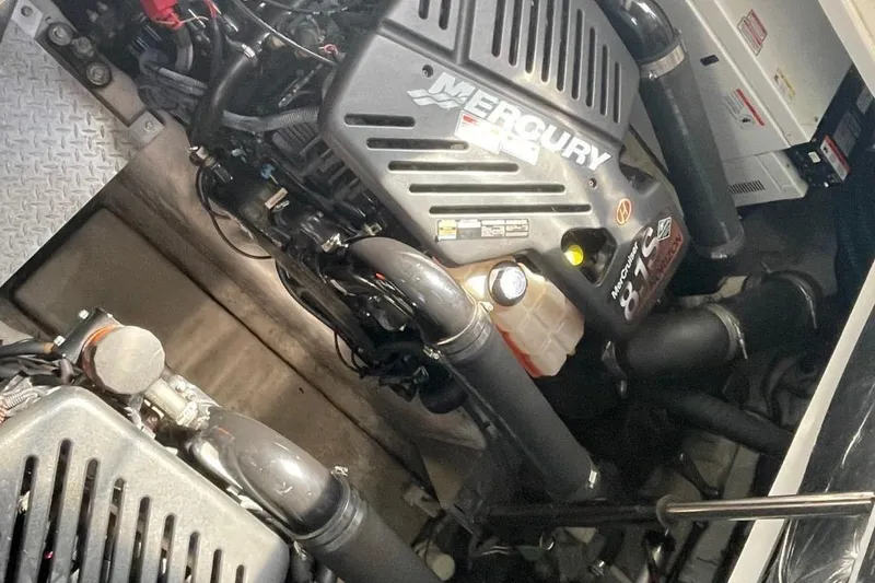 Slide: The Image of Anchor chain mechanism on a 2006 Sea Ray 360 Sundancer boat deck. - 56