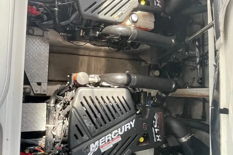 Slide: The Image of Mercury engine in a 2006 Sea Ray 360 Sundancer boat, showcasing mechanical components. - 62