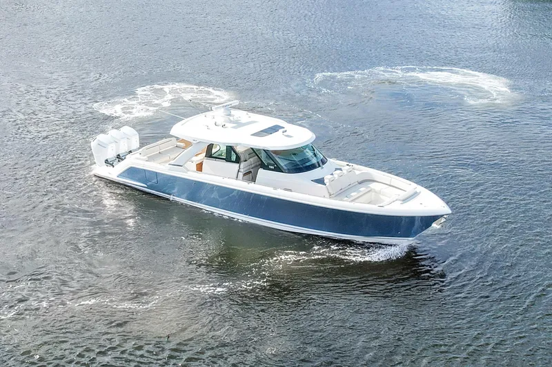 The Image of 2022 Tiara Yachts 48 LS cruising on open water, showcasing sleek design and luxury features. - 1