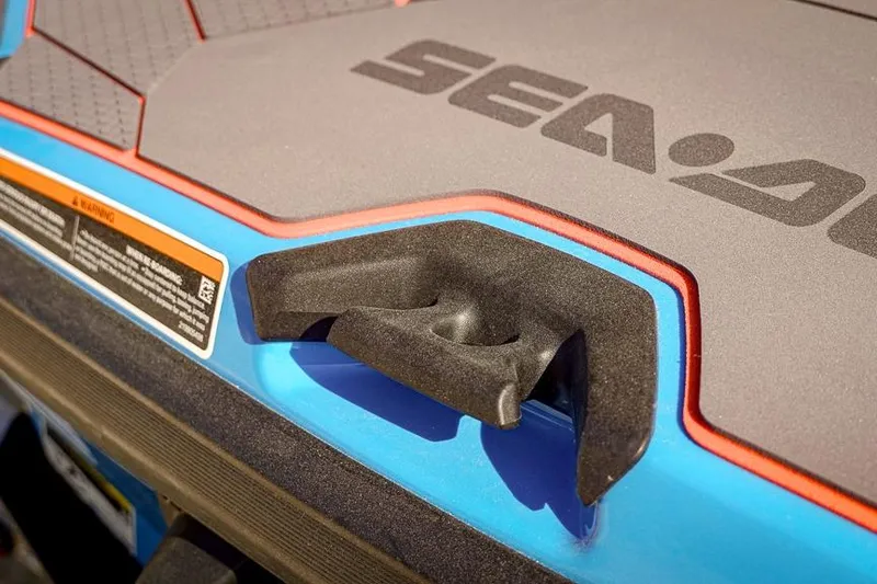 Slide: The Image of Close-up of 2026 Sea-Doo RXT-X 325, showcasing handle and logo detail. - 5