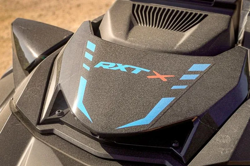 Slide: The Image of 2026 Sea-Doo RXT-X 325 jet ski close-up, showcasing sleek design and branding. - 6