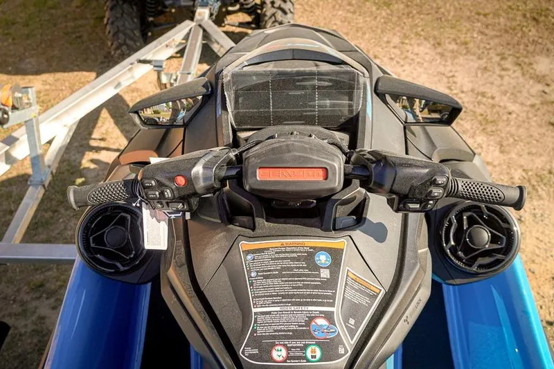 Slide: The Image of 2026 Sea-Doo RXT-X 325 jet ski dashboard with handlebars and control panel. - 7