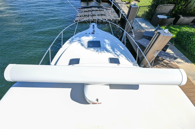Slide: The Image of 2000 Pursuit 3400 Express boat docked, aerial view of bow and deck area. - 12