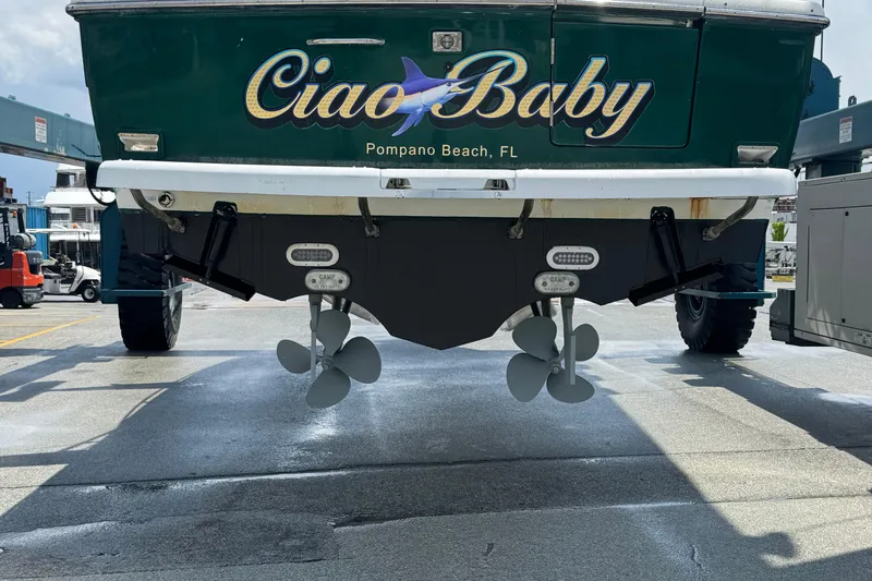 Slide: The Image of Stern view of 2000 Pursuit 3400 Express boat named "Ciao Baby" in Pompano Beach, FL. - 58