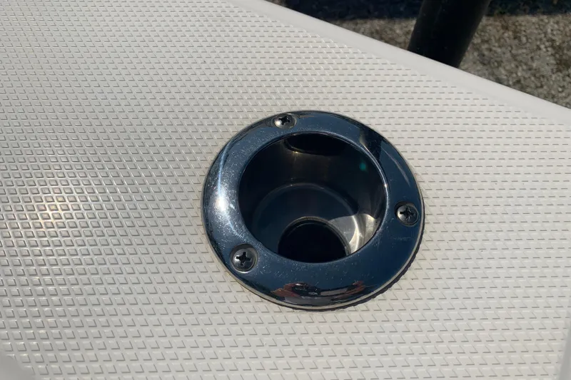 Slide: The Image of Stainless steel rod holder on 2022 Robalo 246 Cayman boat deck. - 12