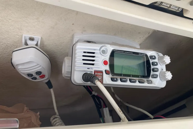 Slide: The Image of VHF radio equipment on a 2022 Robalo 246 Cayman boat. - 21