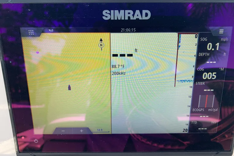 Slide: The Image of Simrad navigation display on 2022 Robalo 246 Cayman boat, showing depth and speed data. - 23
