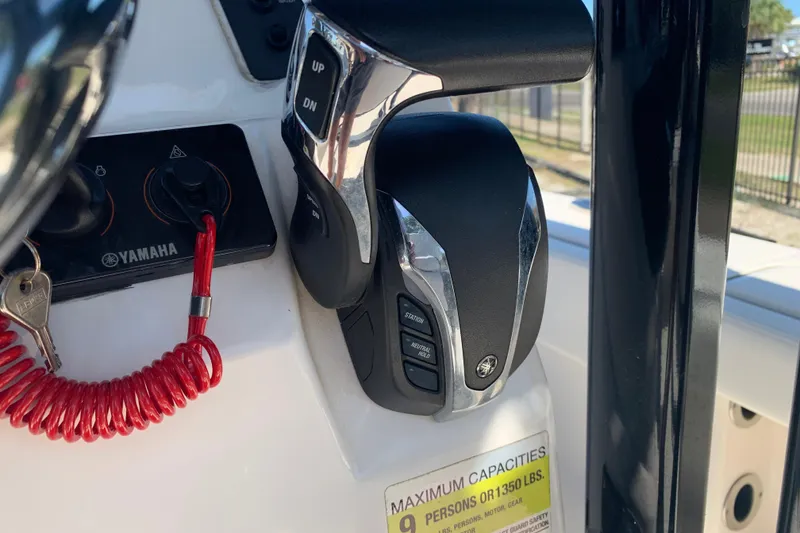 Slide: The Image of Throttle control panel on a 2022 Robalo 246 Cayman boat with Yamaha branding. - 24