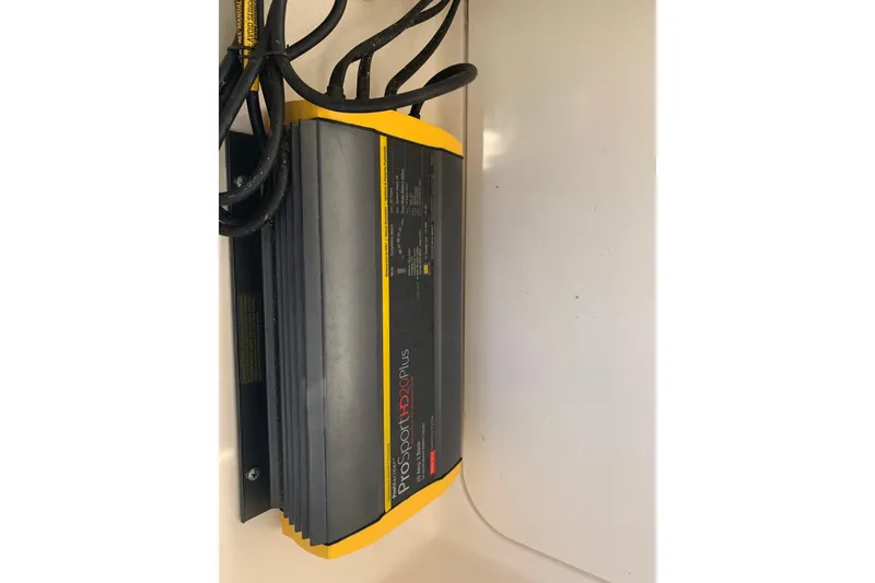 Slide: The Image of Onboard battery charger in 2022 Robalo 246 Cayman boat. - 27