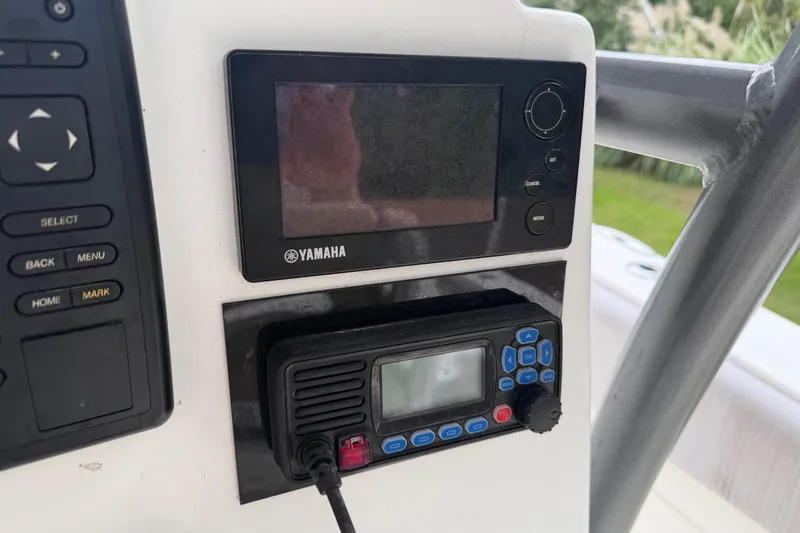 Slide: The Image of Yamaha control panel on 2015 Sea Fox 286 Commander boat dashboard. - 16