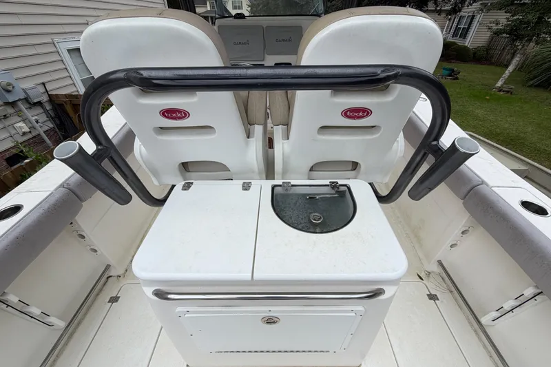 Slide: The Image of 2015 Sea Fox 286 Commander boat interior with seating and storage compartments. - 21