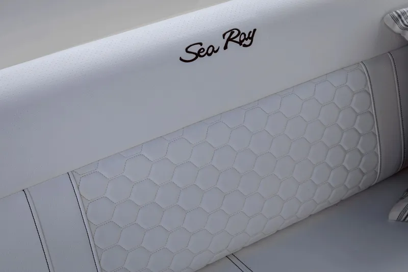 Slide: The Image of Interior of Sea Ray Sundancer 320, 2026, featuring quilted upholstery design. - 16