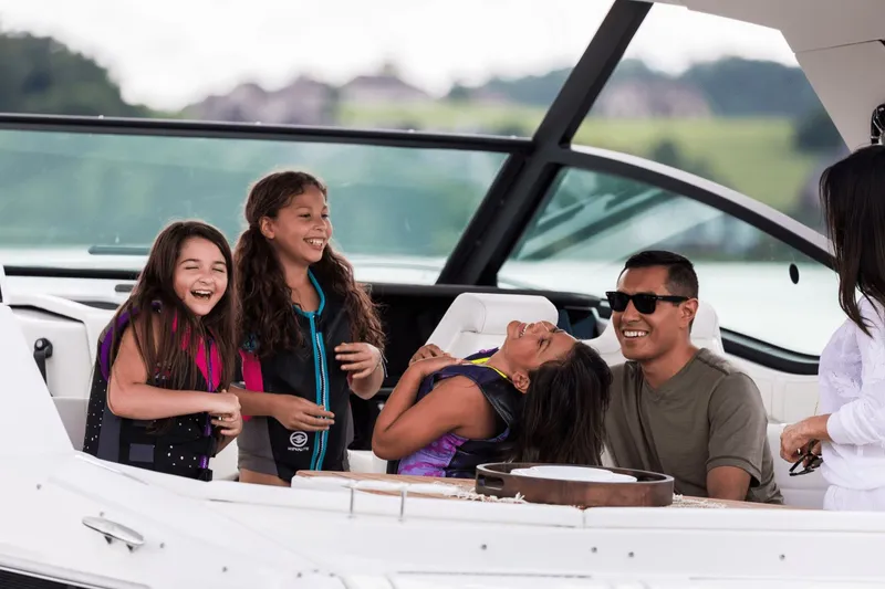 Slide: The Image of Family enjoying a boat trip on Sea Ray Sundancer 320. - 39