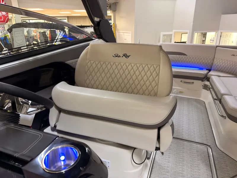 Slide: The Image of The image shows the interior of a Sea Ray SLX 280 boat with beige leather seating. - 39