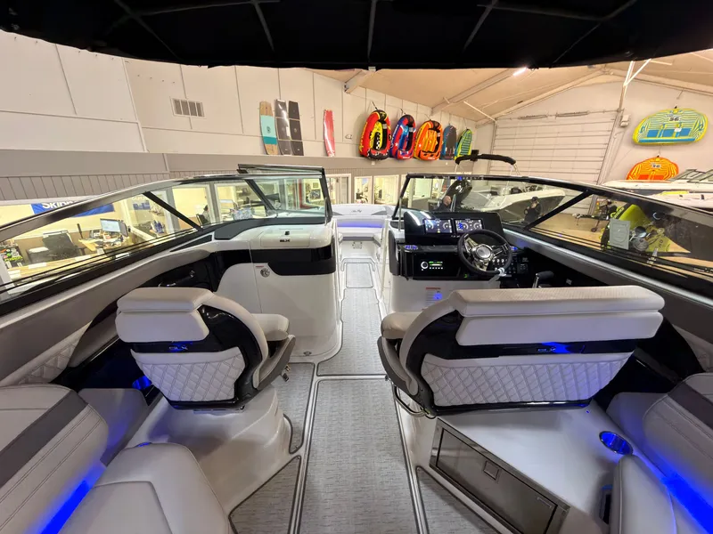 Slide: The Image of Interior view of a Sea Ray SLX 280 boat with luxurious seating and a modern cockpit. - 30