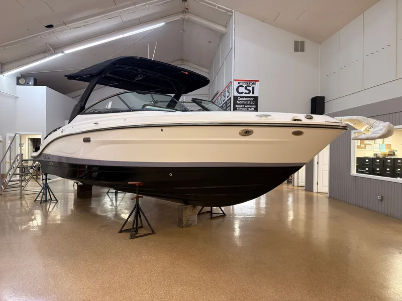 The Image of A 2026 Sea Ray SLX 280 is displayed indoors on stands. - 0