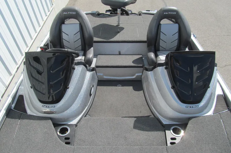 Slide: The Image of 2017 Nitro Z18 boat interior with dual seats and sleek design. - 11