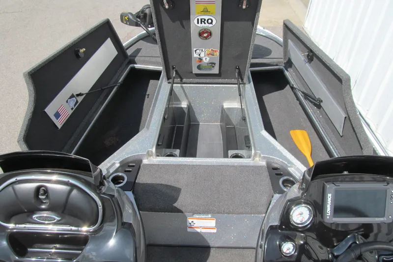 Slide: The Image of 2017 Nitro Z18 boat interior with storage compartments and control panel. - 8