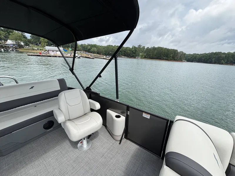 Slide: The Image of Starcraft EXS 3 Q DH 2025 pontoon boat on a serene lake. - 10