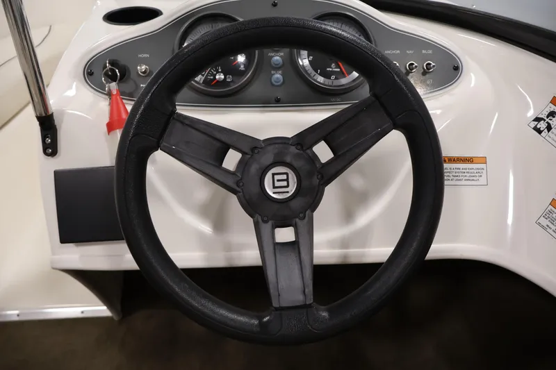 Slide: The Image of Steering wheel and dashboard of 2019 Bayliner 160 Bowrider boat. - 15