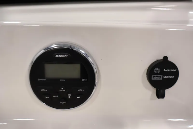 Slide: The Image of 2019 Bayliner 160 Bowrider audio system with Jensen controls and USB input. - 21