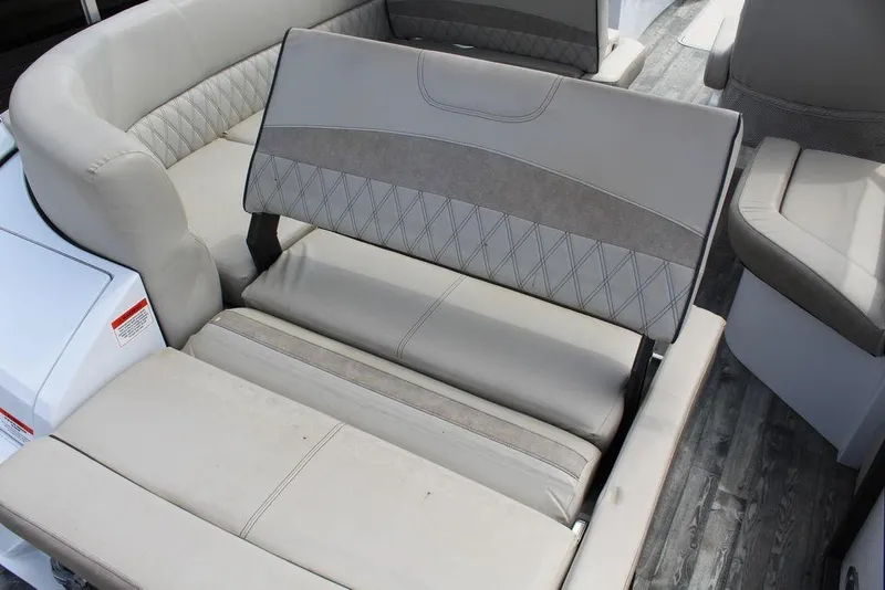 Slide: The Image of 2019 Crest Savannah 250 SLRC boat interior with luxurious gray seating and quilted design. - 23