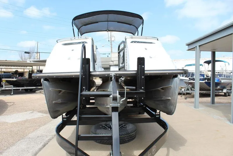 Slide: The Image of 2019 Crest Savannah 250 SLRC pontoon boat on trailer, viewed from the front. - 7